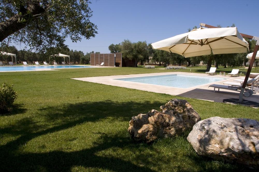 Masseria Corda Di Lana Hotel & Resort Torre Lapillo Exterior photo