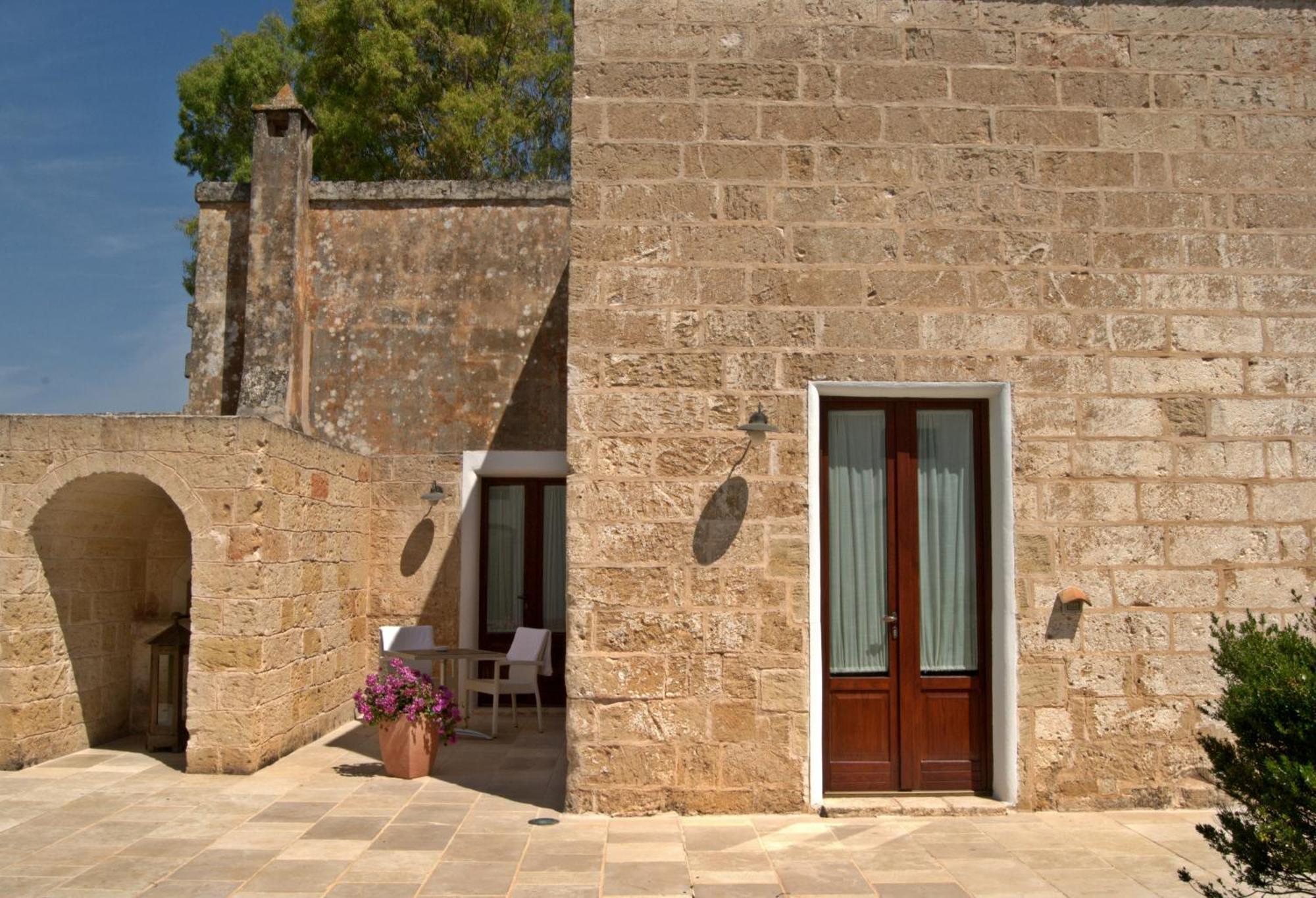 Masseria Corda Di Lana Hotel & Resort Torre Lapillo Exterior photo