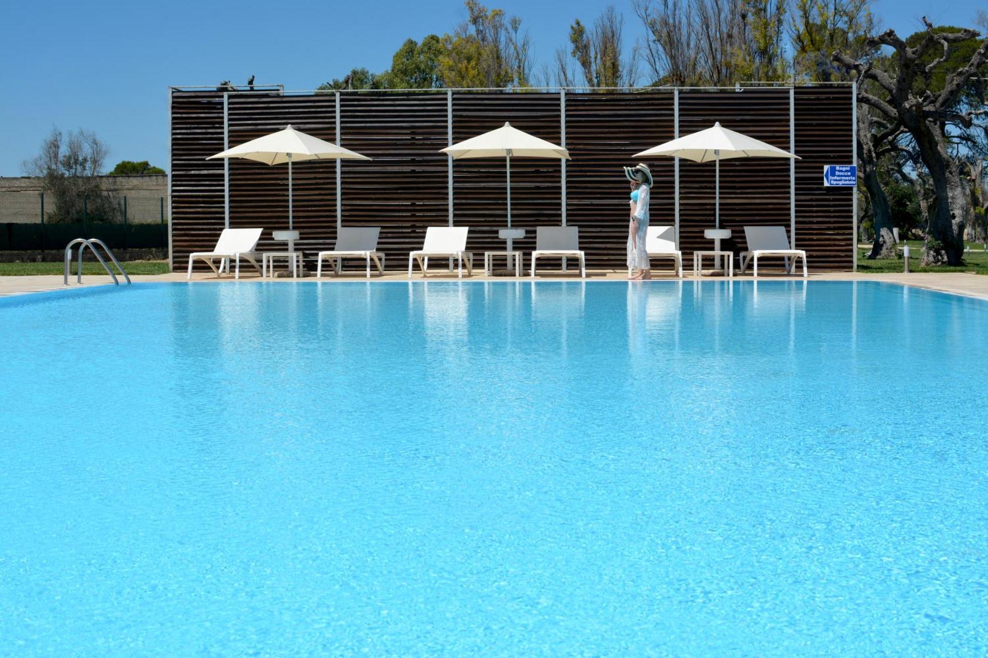 Masseria Corda Di Lana Hotel & Resort Torre Lapillo Exterior photo